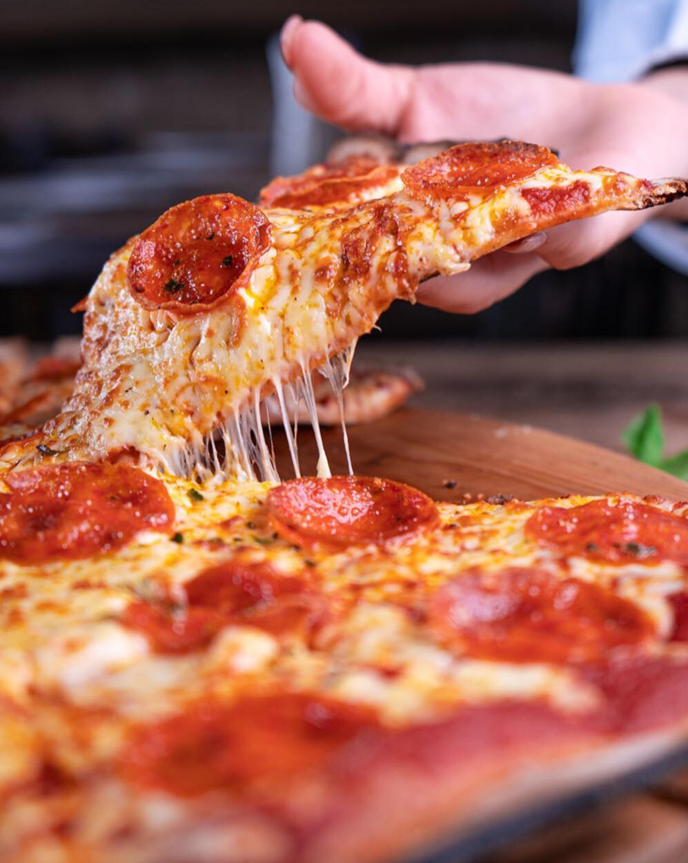 The Baldy Chef's Kitchen Pizza Slice Image